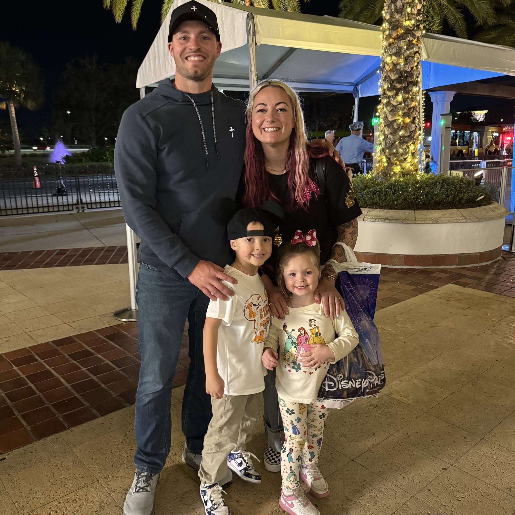 Jared Smith with his wife and two young children